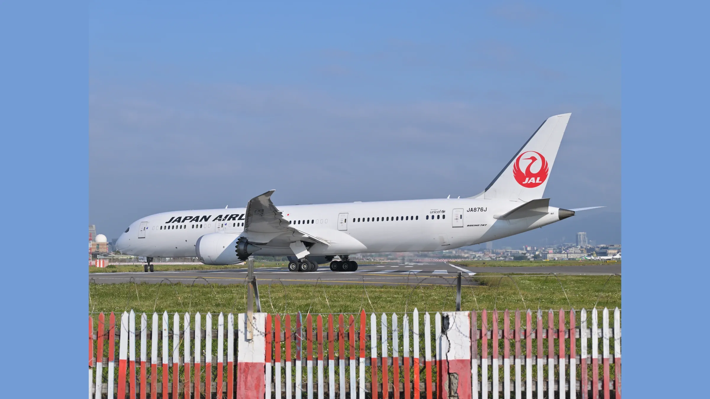 Japan Airlines Boeing 787-9 JA876J on the runway at Taipei Songshan.