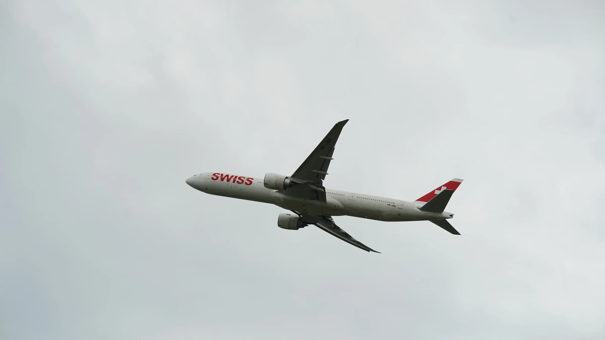 SWISS Boeing 777 HB-JNH taking off from Narita.