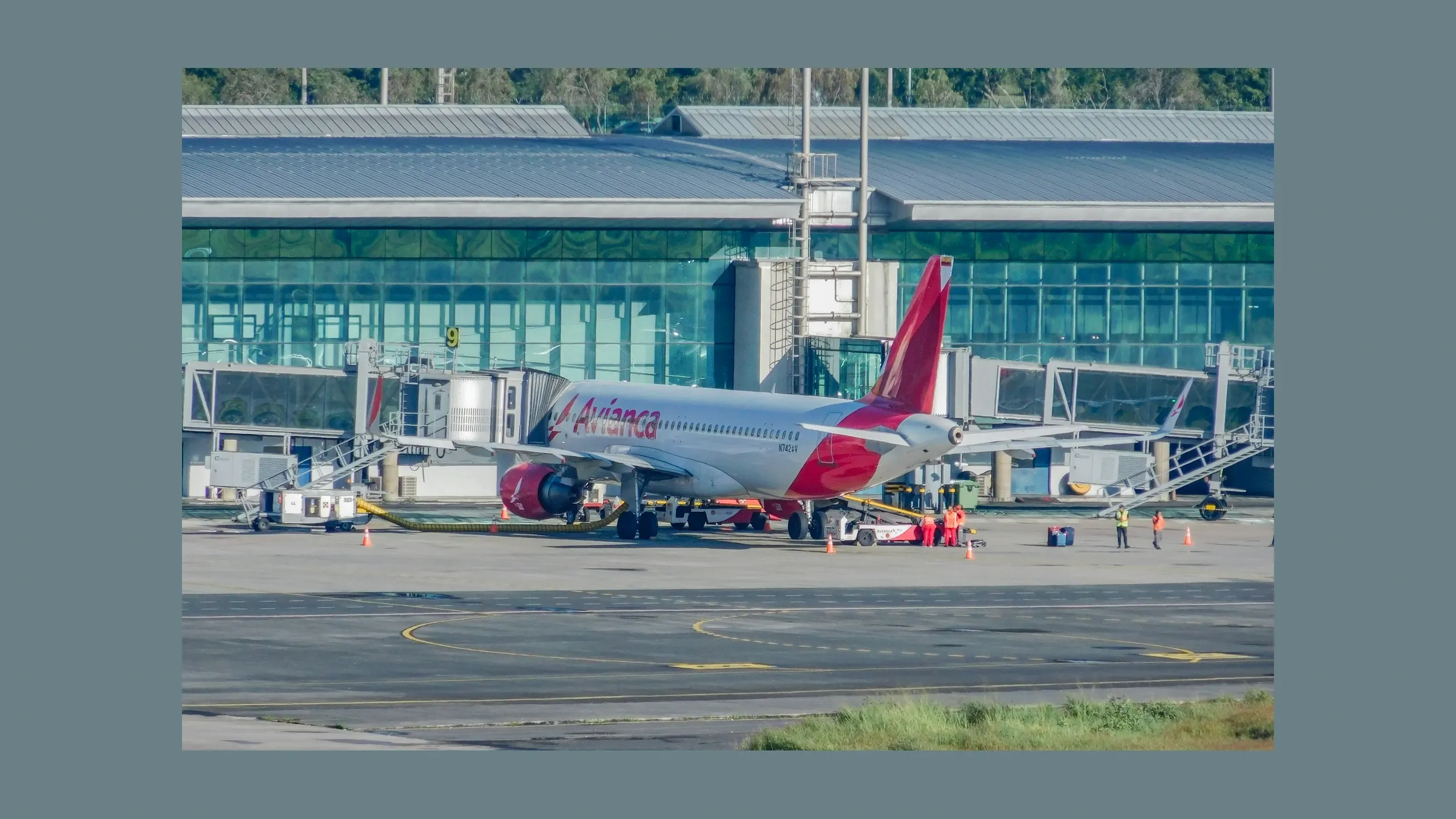 Avianca Airbus A320 N742AV parked at La Aurora airport.