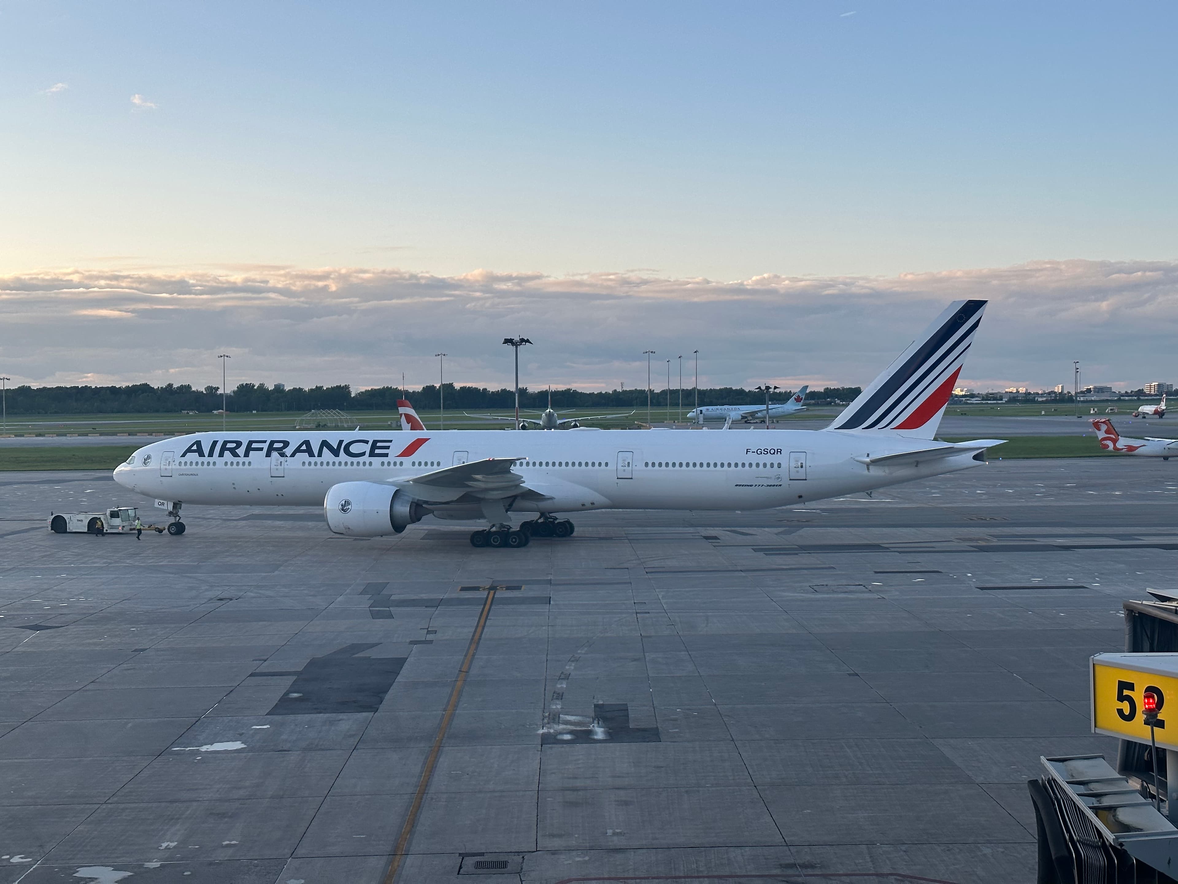 Side view of an Air France Boeing 777-300ER on the apron in Montreal.
