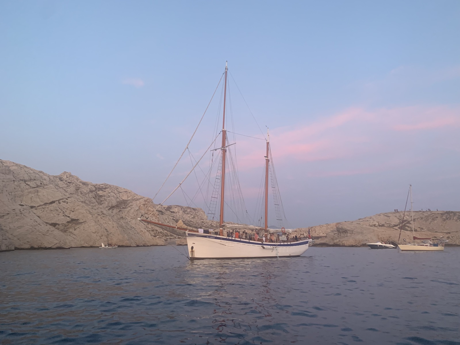France: French Riviera Travel Guide | Itineraries and Highlights - Sunset Party on a Boat on the Friuli Archipelago. Credit Chovelon L