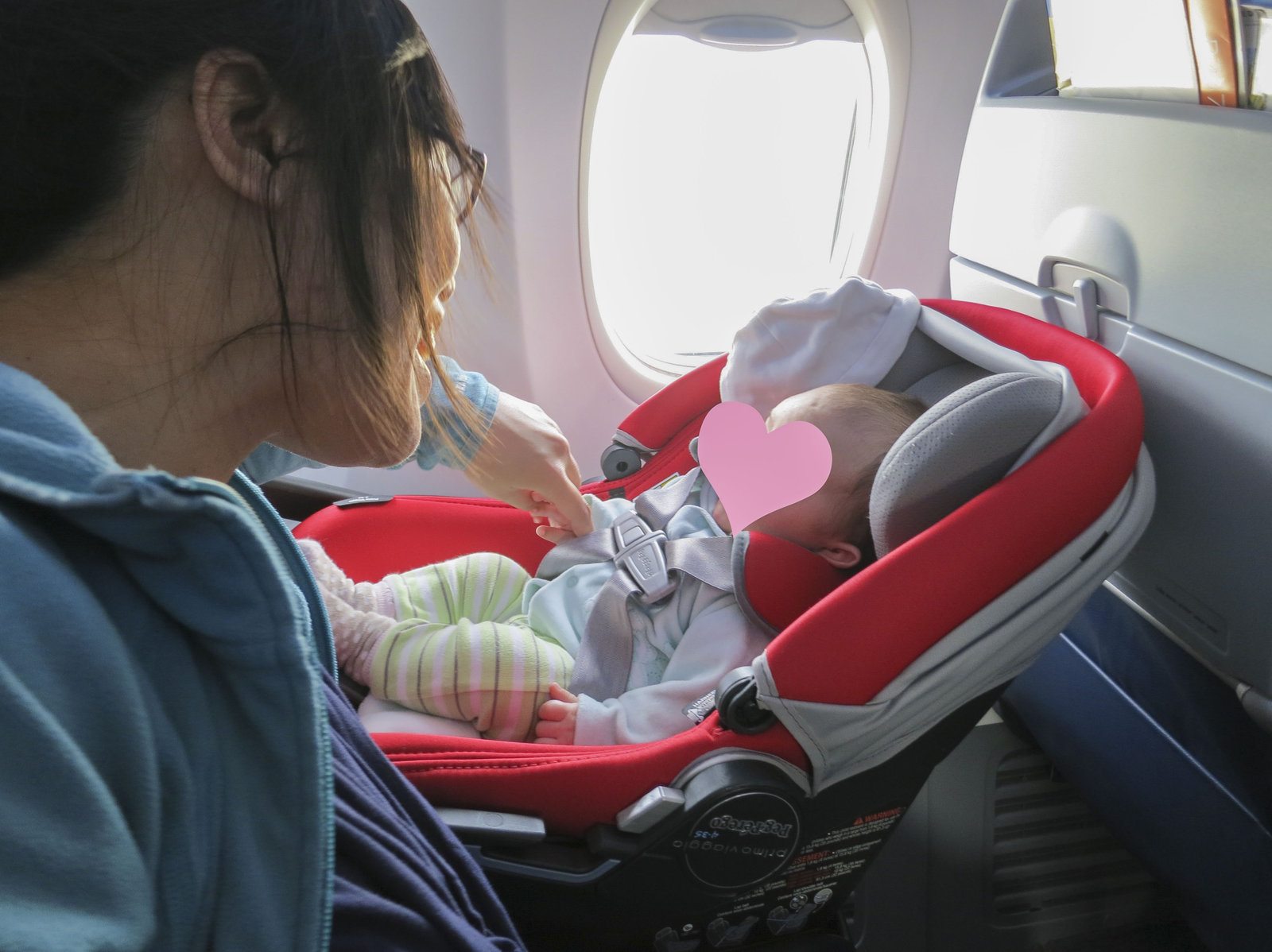 Voyage en famille&nbsp;: Les meilleures astuces pour des vacances mémorables - Siège assigné pour bébé
