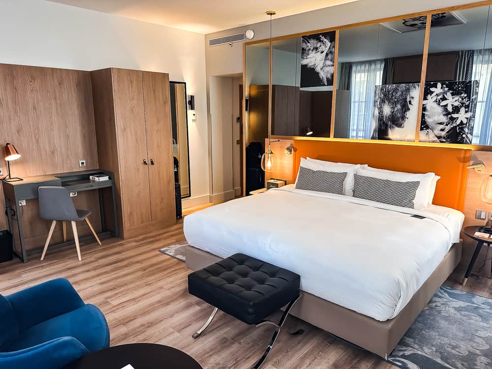 Modern room with a king-size bed and contemporary décor at the Renaissance Paris Place Vendome
