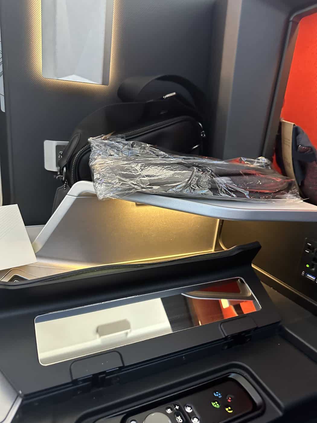 Review: Delta A350 | Delta One Suite | SYD-LAX - Console and slippers