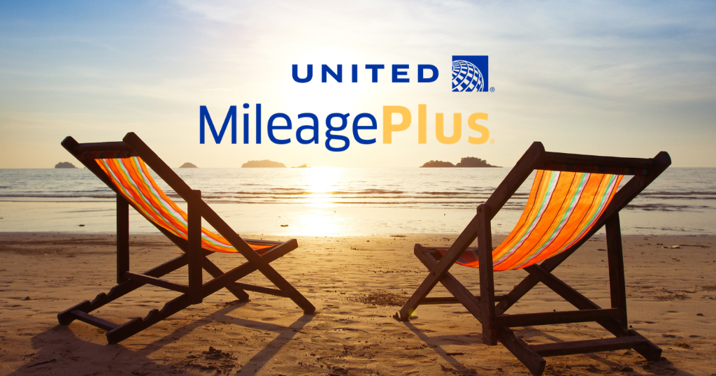 Two beach chairs on the beach by the water during sunset