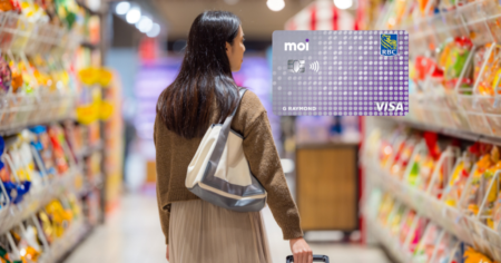Moi RBC Visa feature image - woman walking in shop with basket