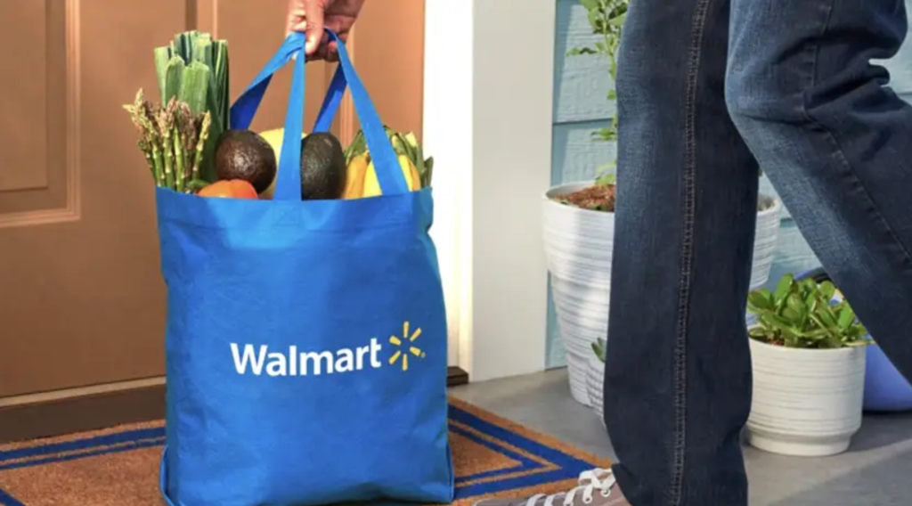 Walmart delivery person leaving grocery bag at front door