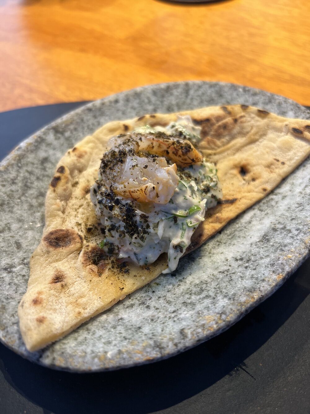 Grilled shrimp on pita bread at the pool restaurant