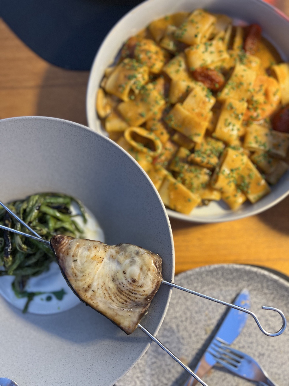 Fresh pasta and grilled fish at the rooftop restaurant