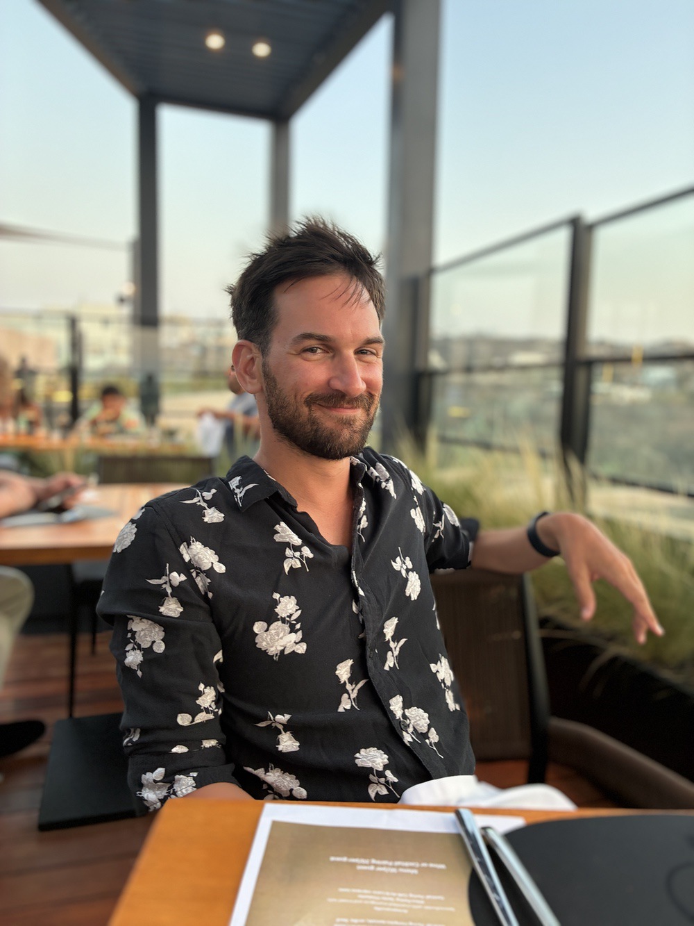 Jonathan Riverin at the rooftop restaurant of Domes Novos Santorini