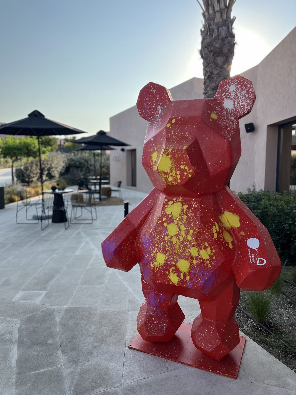 Bear sculpture from the Domes Menta Collection on the hotel terrace