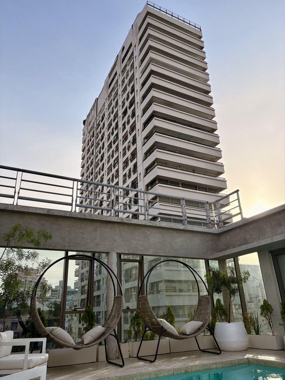 Rooftop terrace pool at the Recoleta Grand at dusk